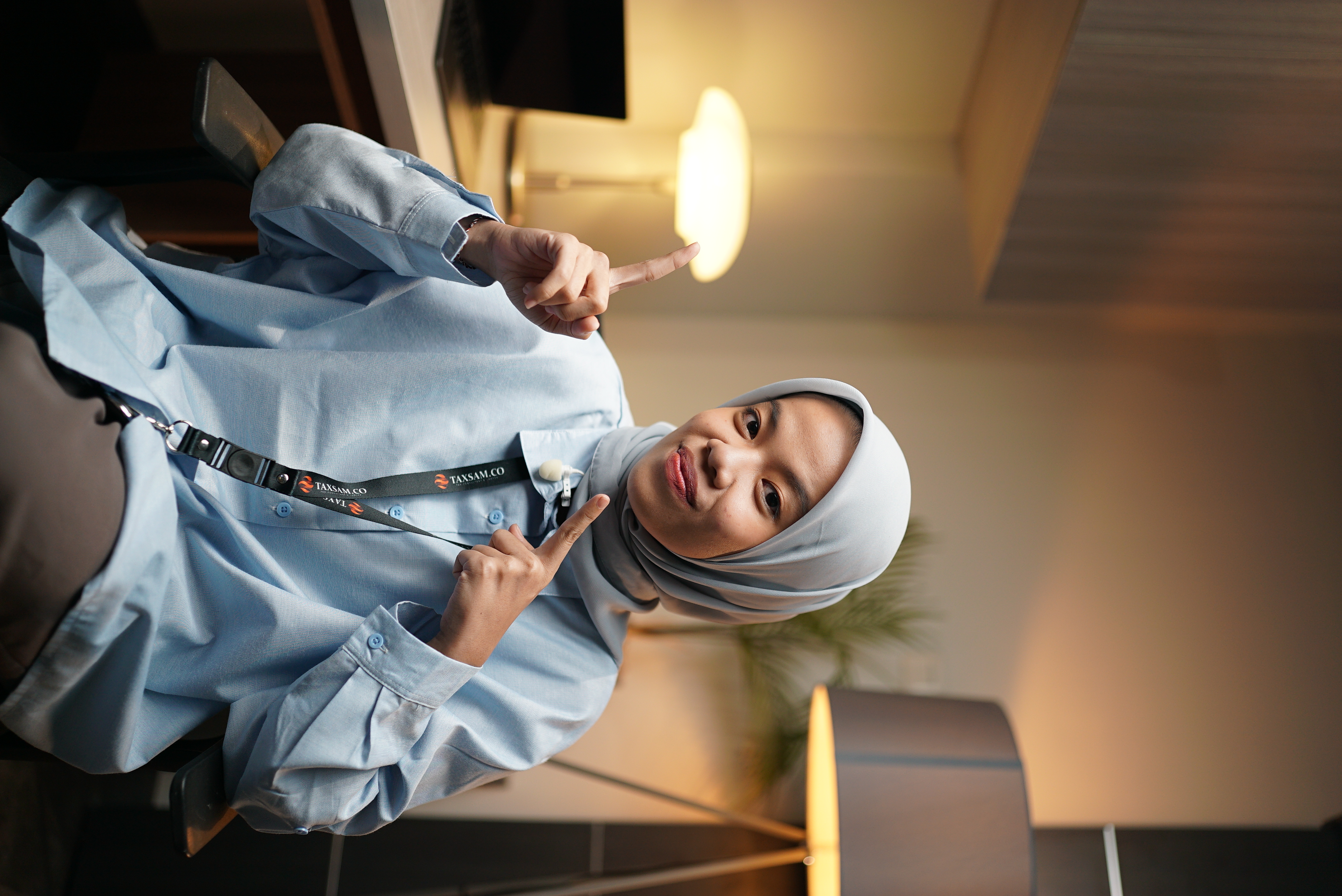 Team member pointing to handbook